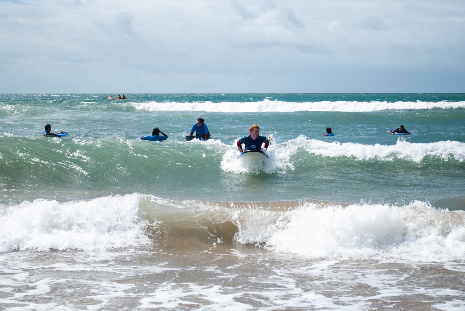 Surfen an der Küste Devons mit unserem Sprachkurs plus Sport