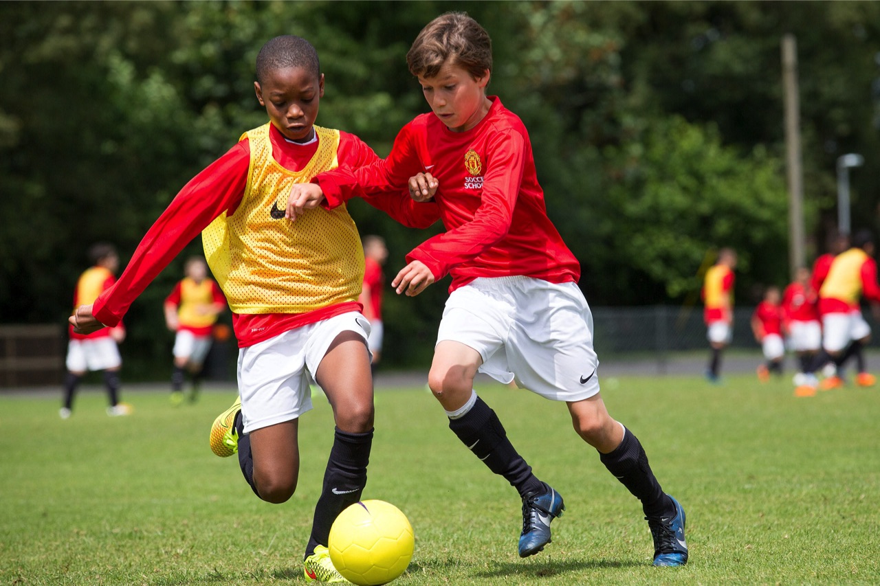 Voller Körpereinsatz beim Training mit der Manchester United Soccer School